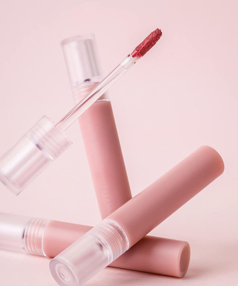 AND:AR Matte Lip Color in soft pink tone with applicator, perfect for long-lasting wear and vibrant color. Ideal for beauty enthusiasts.