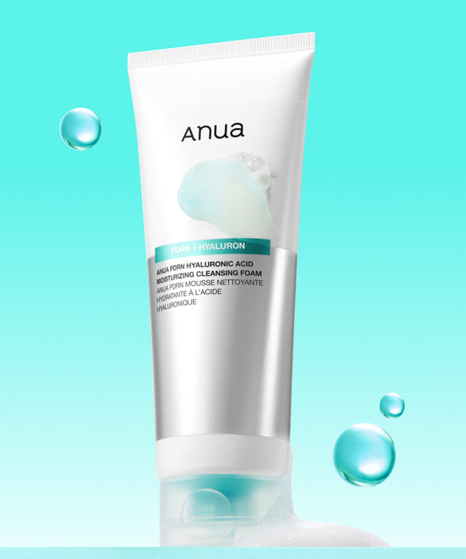ANUA PDRN Hyaluronic Acid Moisture Cleansing Foam 150ml tube on a blue background with water bubbles.