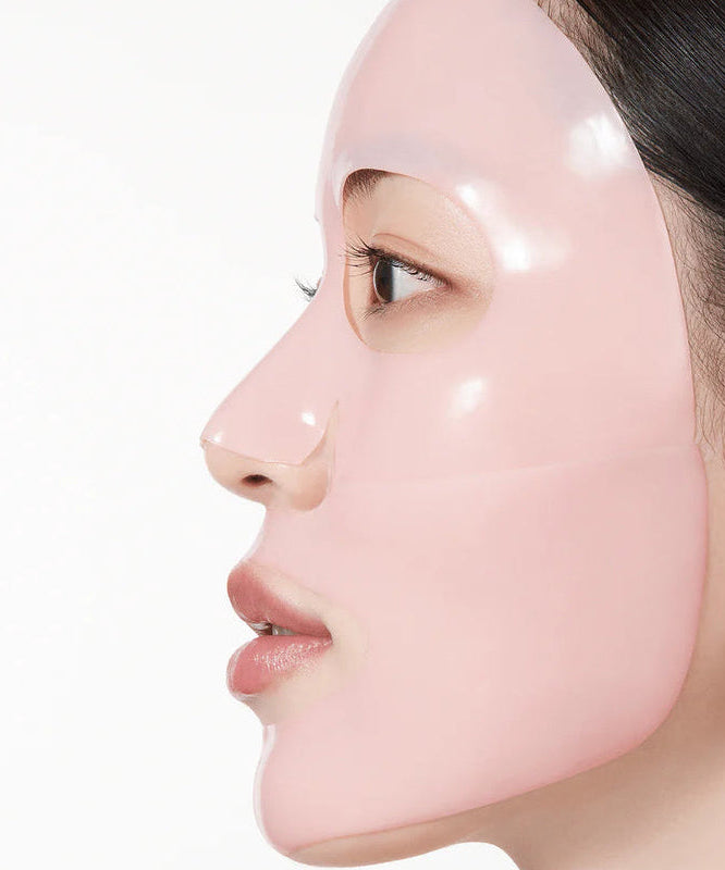 Side view of woman wearing ANUA Peach 70 Niacin Brightening Collagen Mask 4pcs