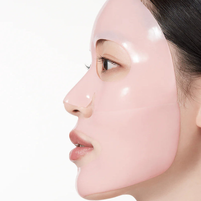Side view of woman wearing ANUA Peach 70 Niacin Brightening Collagen Mask 4pcs