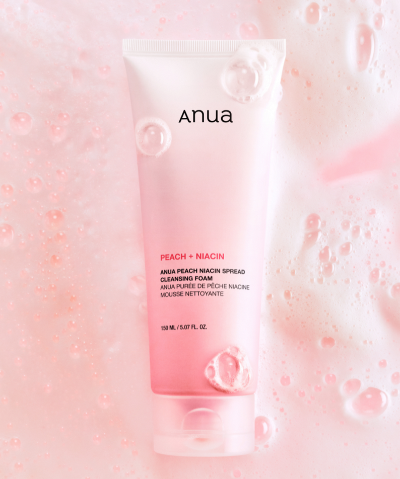 ANUA Peach Niacin Spread Cleansing Foam 150ml with pink bubbles background