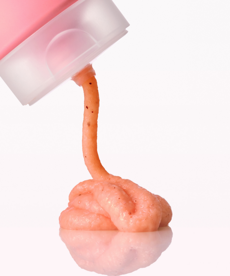 ANUA Peach Niacin Spread Cleansing Foam 150ml being dispensed from tube