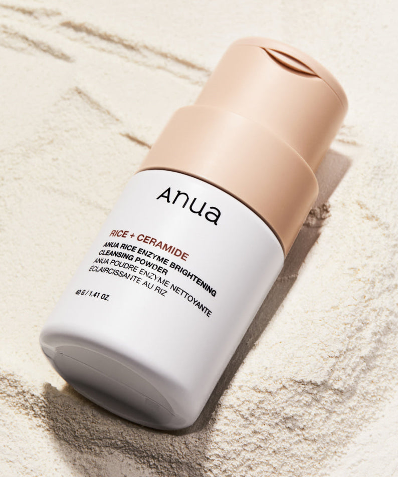 ANUA Rice + Ceramide Brightening Cleansing Powder product bottle on textured surface