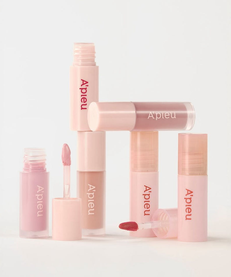 A'PIEU Juicy Pang Bear Cream Blusher Mini in various shades and open containers on display