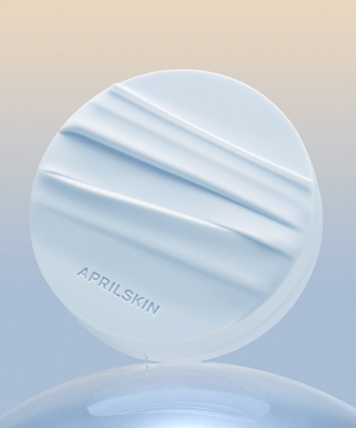 APRIL SKIN Glowing Matt Cushion in a sleek design against a gradient background