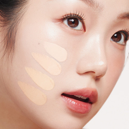 Close-up of a model's face with APRIL SKIN Hero Cushion shades applied on the cheek, showcasing natural coverage and smooth finish.
