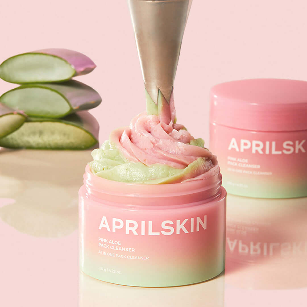 APRILSKIN Pink Aloe Pack Cleanser with fresh aloe slices in background