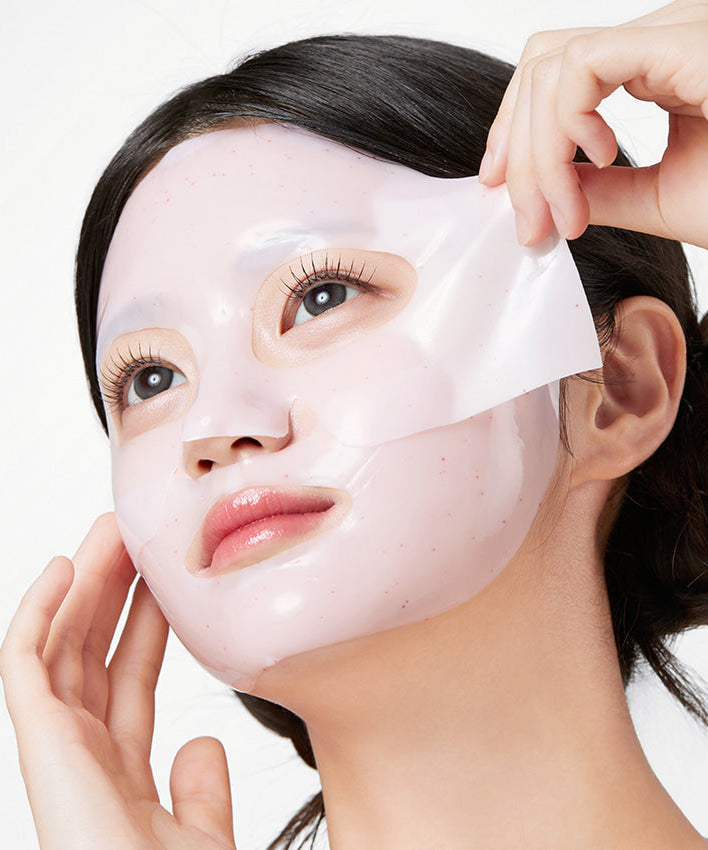 Woman applying APRILSKIN TXA Niacinamide Collagen 99 Capsule Gel Mask 4 Sheets for skincare