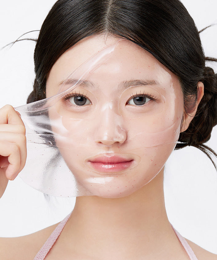 APRILSKIN TXA Niacinamide Collagen 99 Capsule Gel Mask 4 Sheets applied on woman's face demonstrating skincare effect