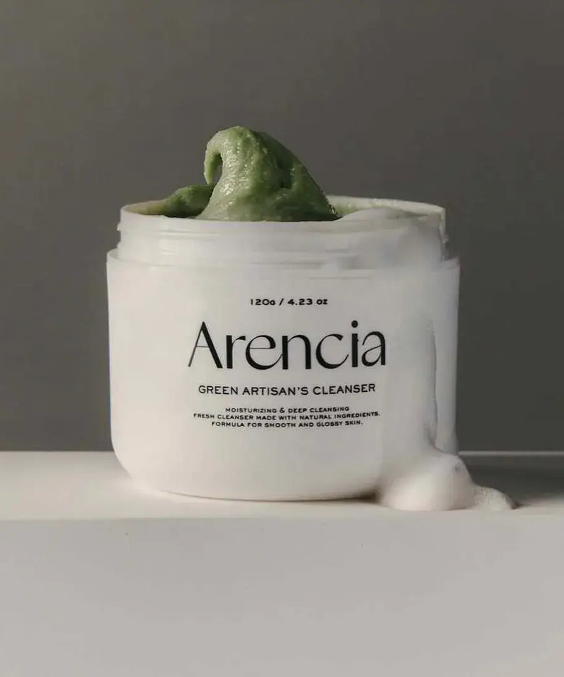 ARENCIA Green Artisan Skin Boosting Cleanser 120g in a white jar with green cleanser displayed on a neutral background.