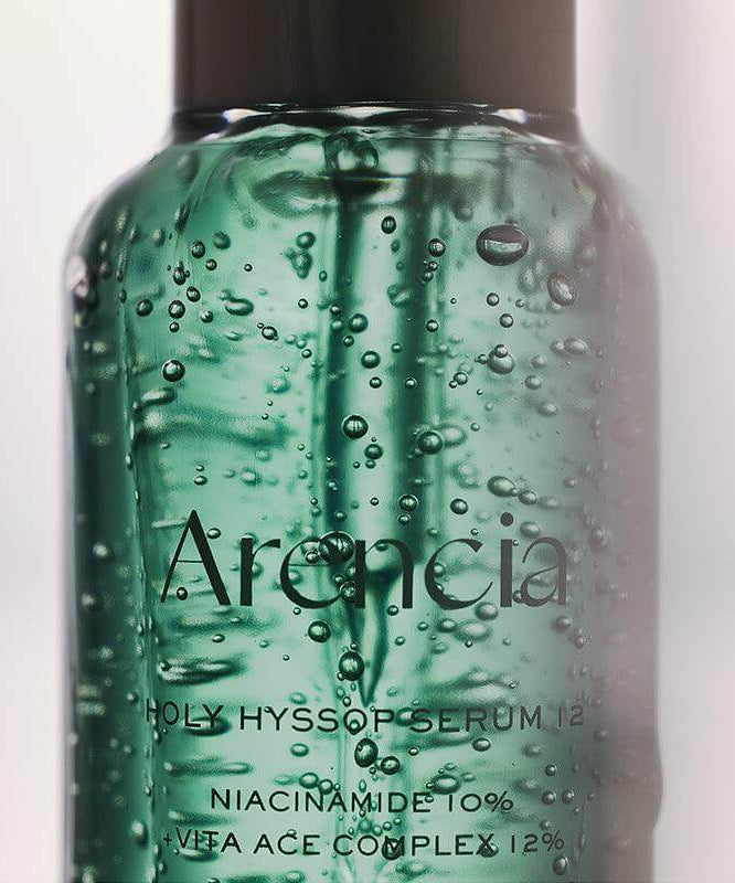 ARENCIA Holy Hyssop Serum 12 30ml in glass bottle, highlighting niacinamide and vita ace complex, skincare product.
