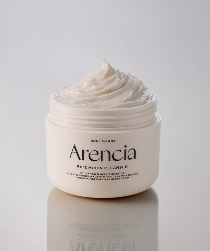 Open jar of ARENCIA Rice Mucin Cleanser 120g with creamy texture on display