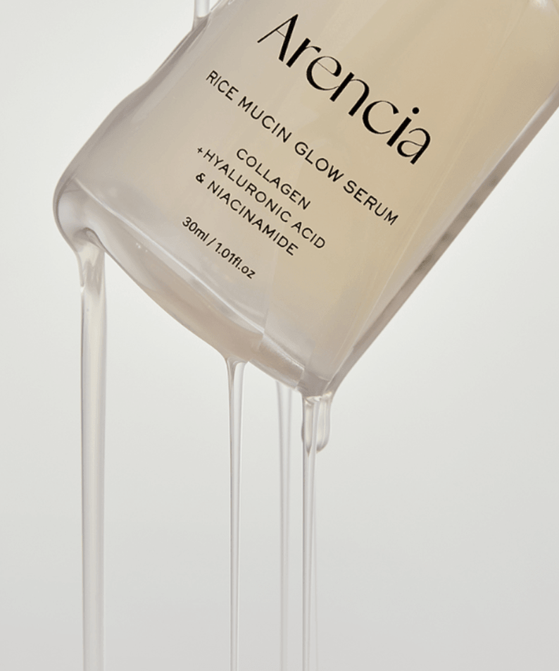ARENCIA Rice Mucin Glow Serum 30ml bottle with serum flowing