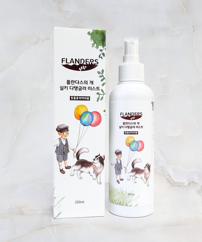 ATOMANDE Flander's Dog Silky Detangler Mist 200ml bottle and packaging on a marble surface