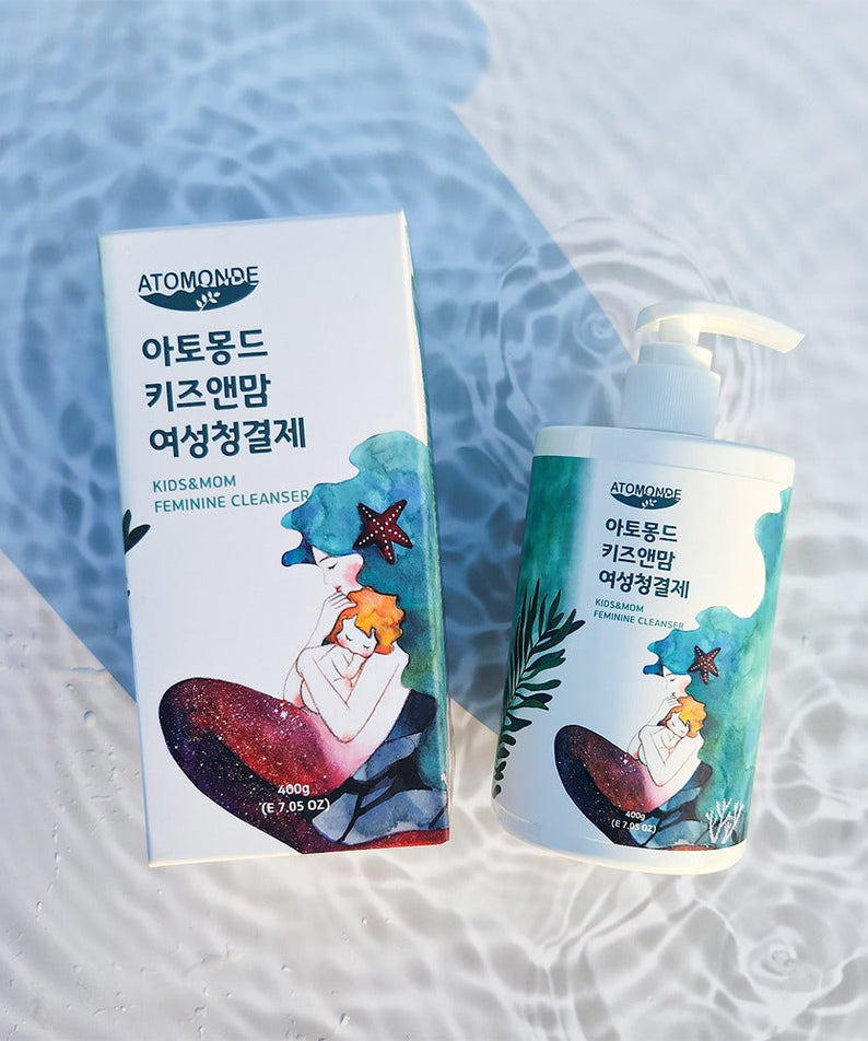ATOMANDE Kids & Mom Feminine Cleanser 400g bottle and packaging on a textured background