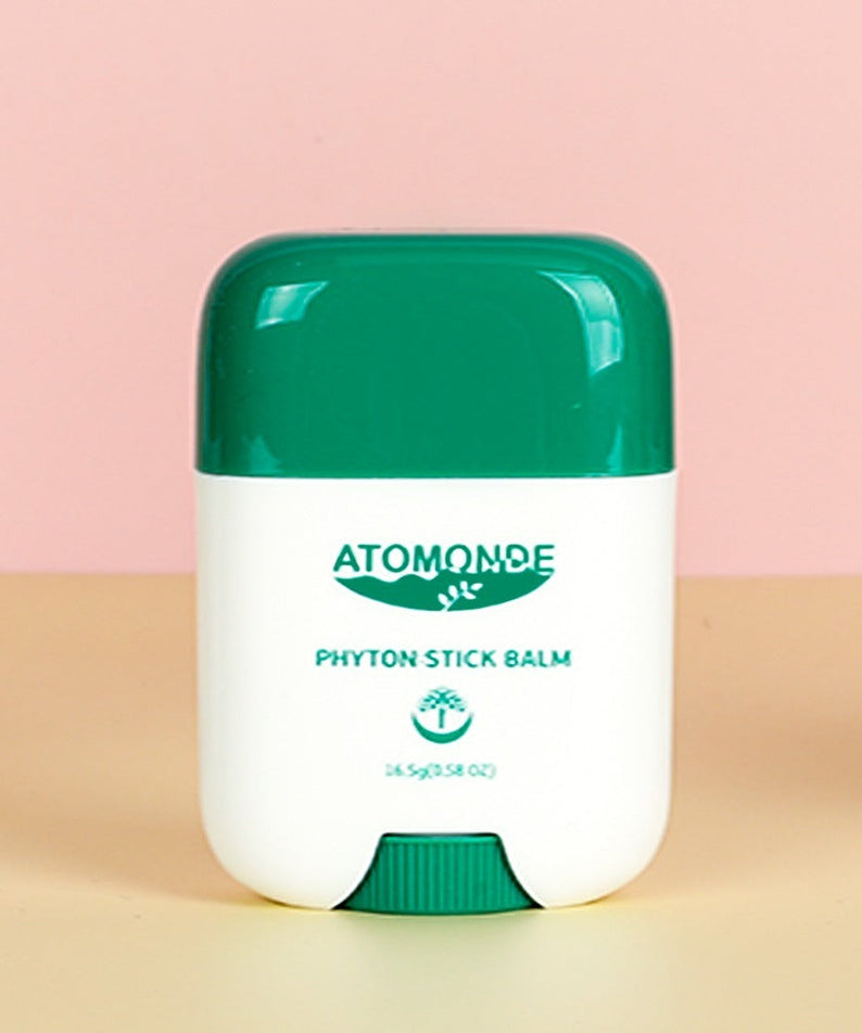 ATOMANDE Phyton Stick Balm 16.5g 1ea displayed against pink background