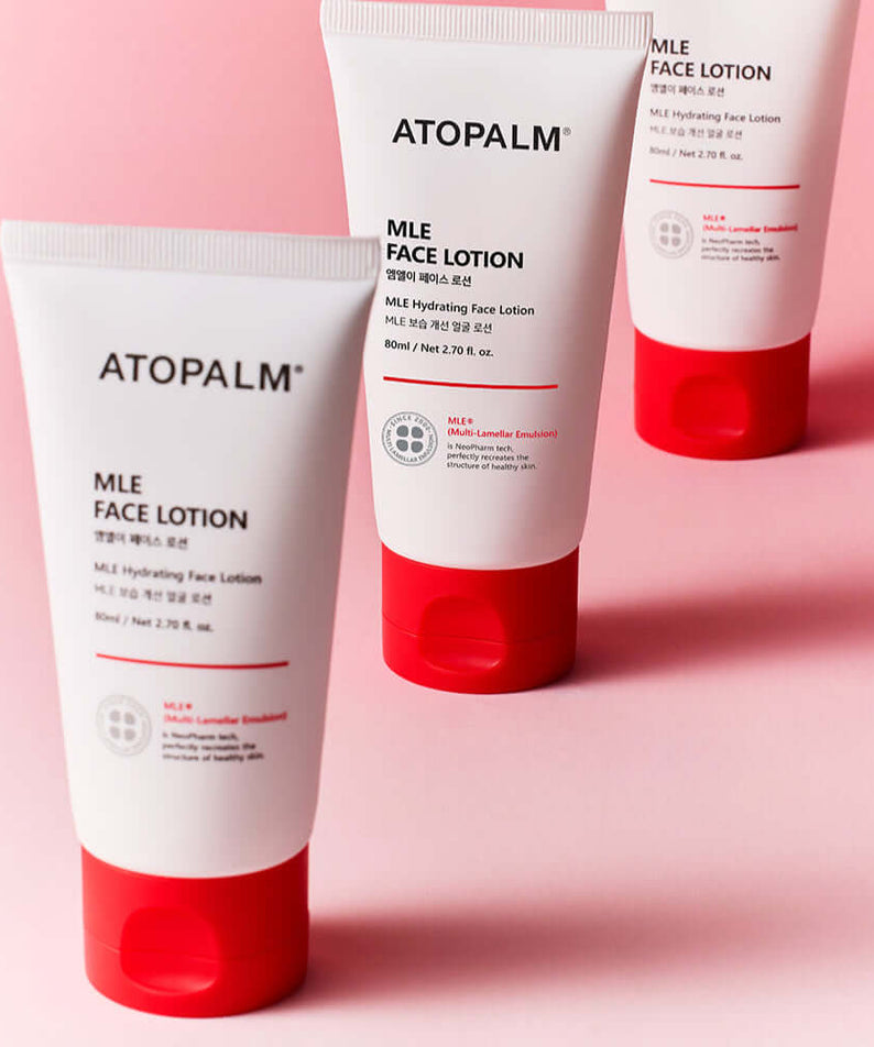 ATOPALM Face Lotion 80ml on pink background, highlighting skincare benefits of ATOPALM Face Lotion 80ml for hydrated, smooth skin.
