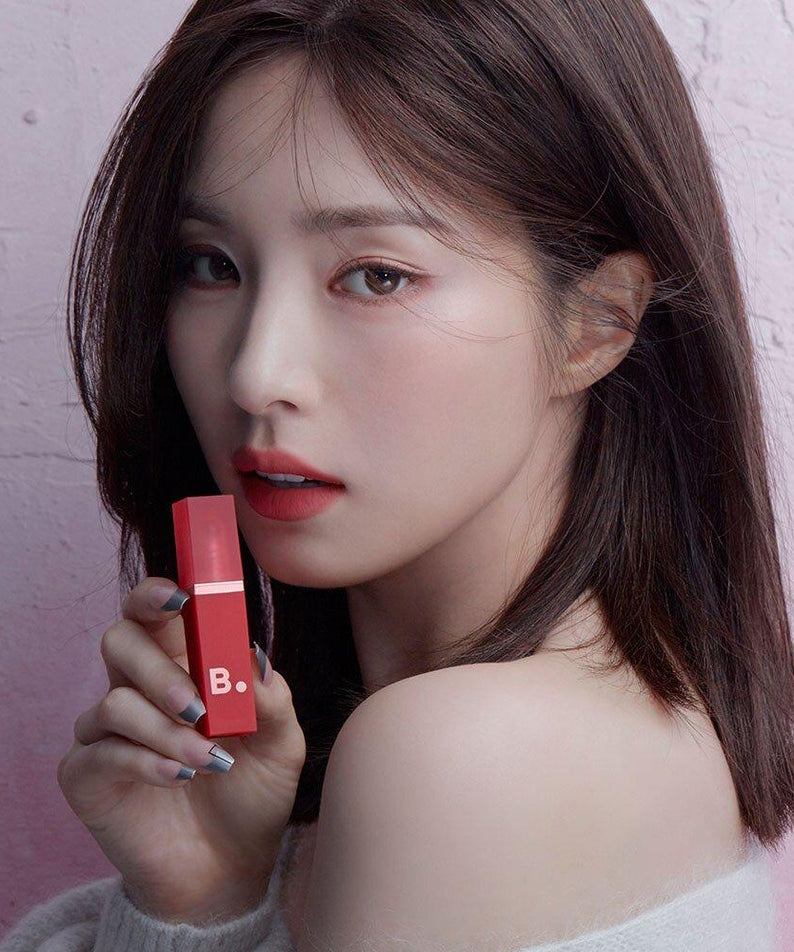 Person holding BANILA CO New Sheer Velvet Veil Tint showcasing makeup product