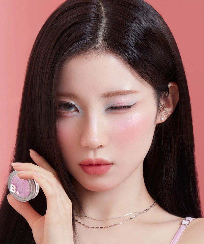 BANILACO Hyper Holobeam Eye Glitter on model with soft makeup look, highlighting eye shimmer and glossy finish for a sparkling effect.