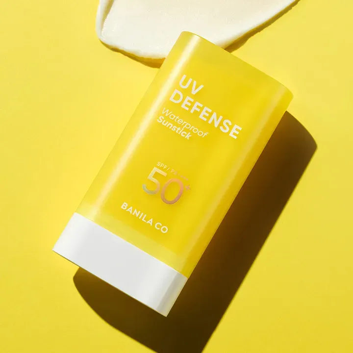 BANILACO UV Defense Waterproof Sun Stick SP50+ PA++++ with yellow packaging on a bright background.