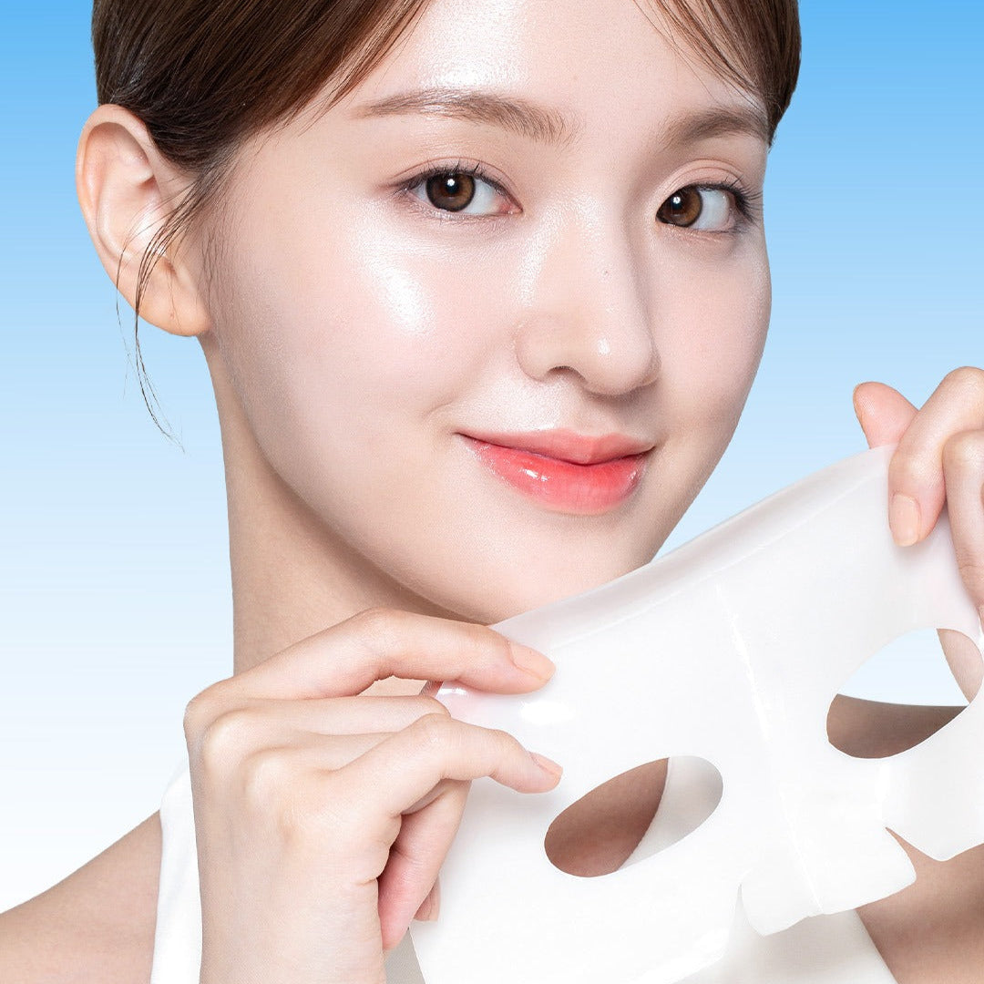 Woman holding BANOBAGI PDRN Collagen Gel Mask 4 sheets with glowing skin.