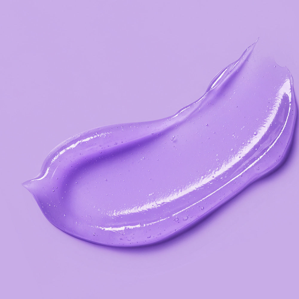 Purple smudge texture of BARULAB Bakuchiol Peptide Smooth Lip Serum 10g on purple background