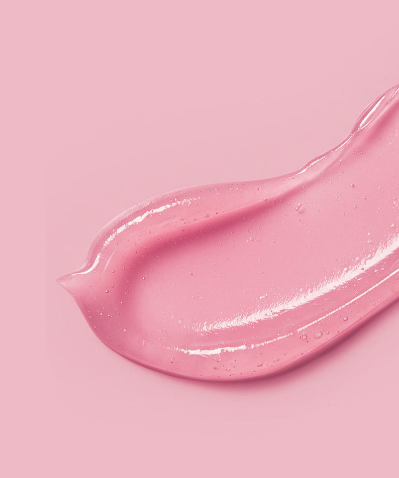 Texture of BARULAB Collagen Caffeine Tangle Lip Serum 10g, pink glossy smear on a matching background.