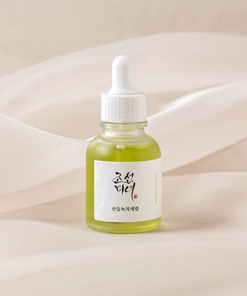 BEAUTY OF JOSEON Calming Serum Green Tea + Panthenol 30ml product bottle on a soft fabric background