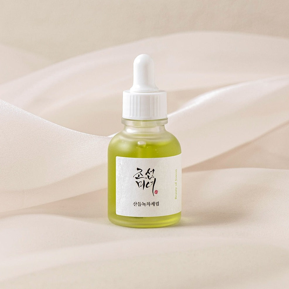 BEAUTY OF JOSEON Calming Serum Green Tea + Panthenol 30ml product bottle on a soft fabric background