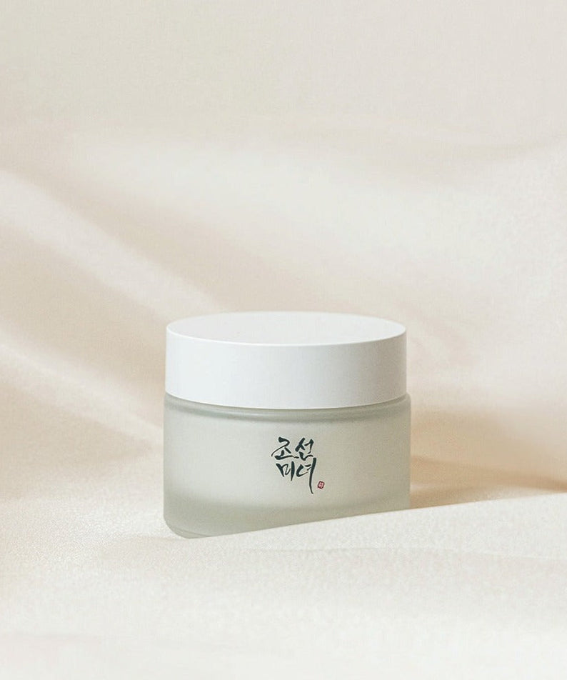 BEAUTY OF JOSEON Dynasty Cream in elegant jar on soft fabric background, ideal for skincare routine.