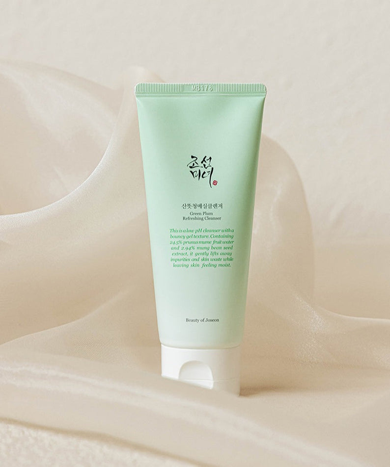 BEAUTY OF JOSEON Green Plum refreshing Cleanser 100ml on a soft fabric background