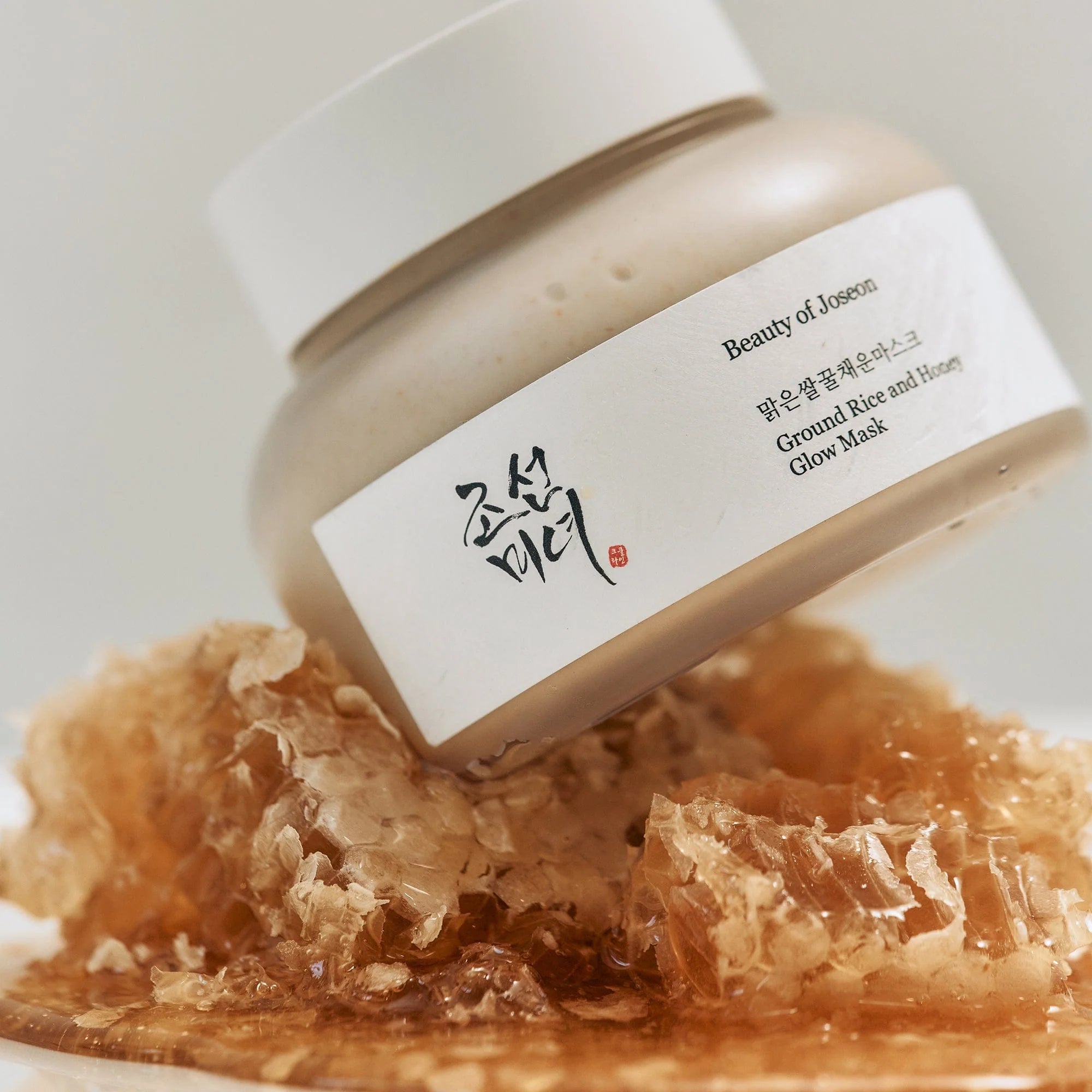 BEAUTY OF JOSEON Ground Rice and Honey Glow Mask 150ml with honeycomb showcasing luxurious skincare product.