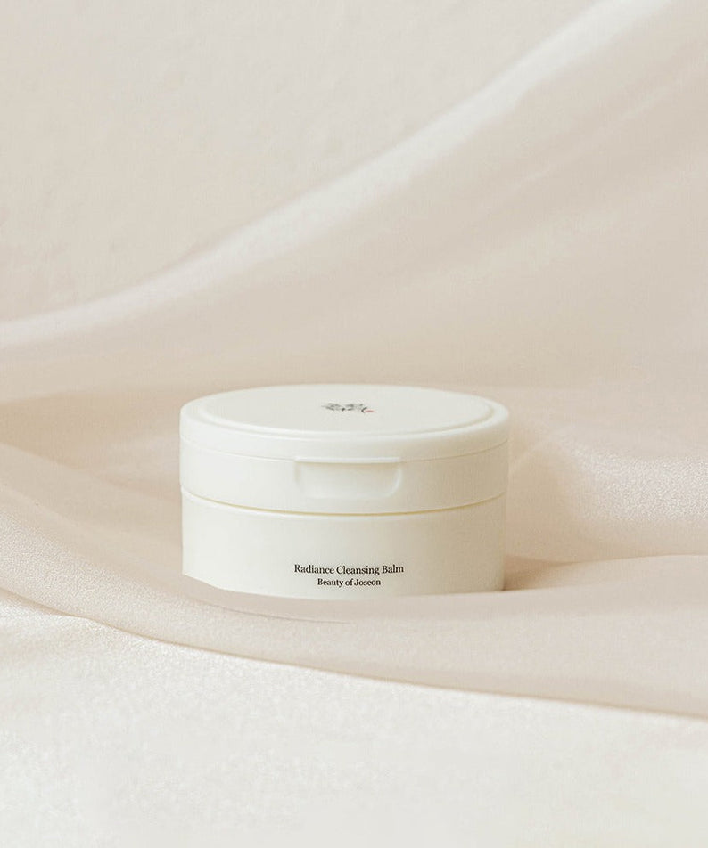 BEAUTY OF JOSEON Radiance Cleansing Balm 100ml on a soft fabric background.