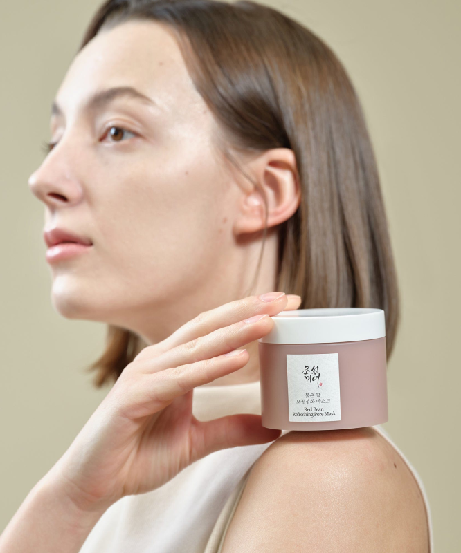 Woman holding BEAUTY OF JOSEON Red Bean Refrshing Pore Mask 140ml