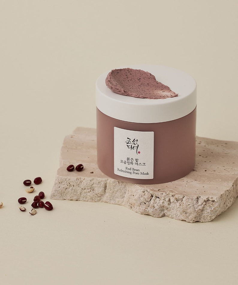 BEAUTY OF JOSEON Red Bean Refrshing Pore Mask 140ml on stone surface with red beans