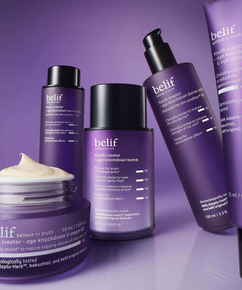 BELIF Age Knockdown Bomb Serum 50ml in a collection of BELIF skincare products, anti-aging beauty solutions displayed in purple bottles