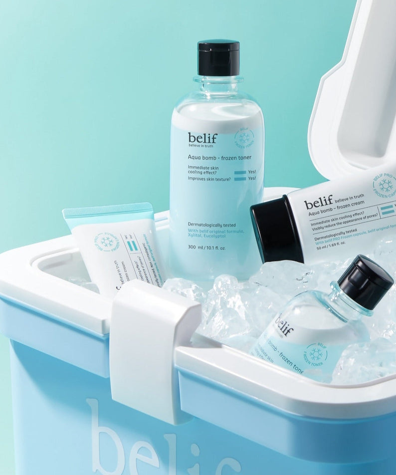 BELIF Aqua Bomb Frozen Cream 50ml displayed with skincare products in an ice bucket.
