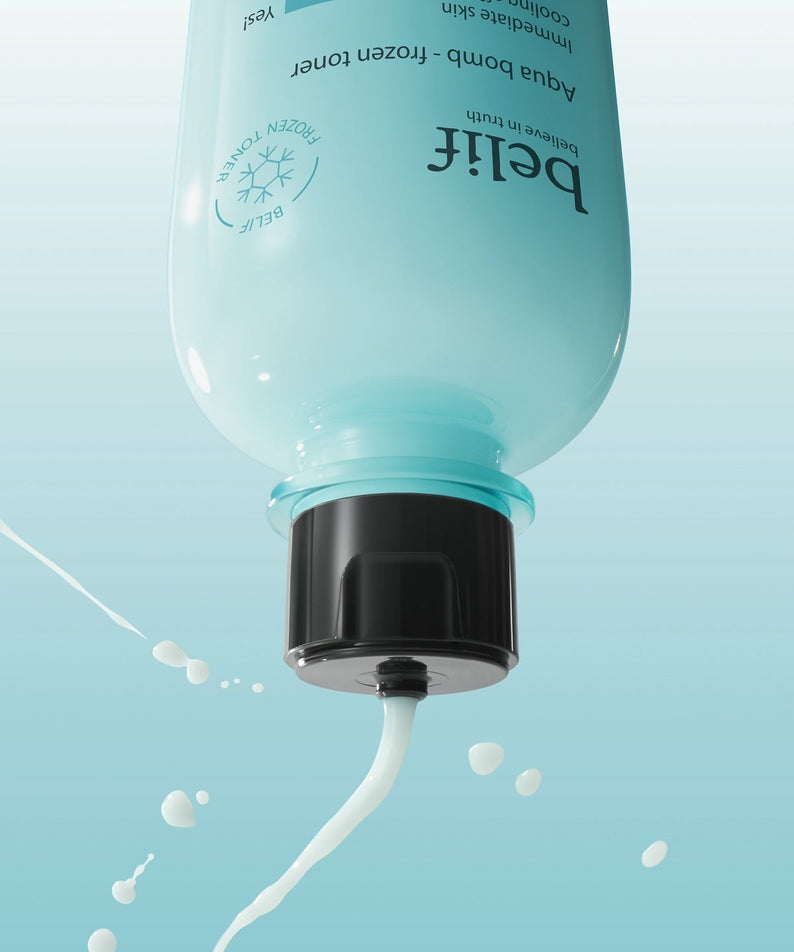 Close-up of BELIF Aqua Bomb Frozen Toner 330ml bottle with product flowing, highlighting hydration and cooling effects.