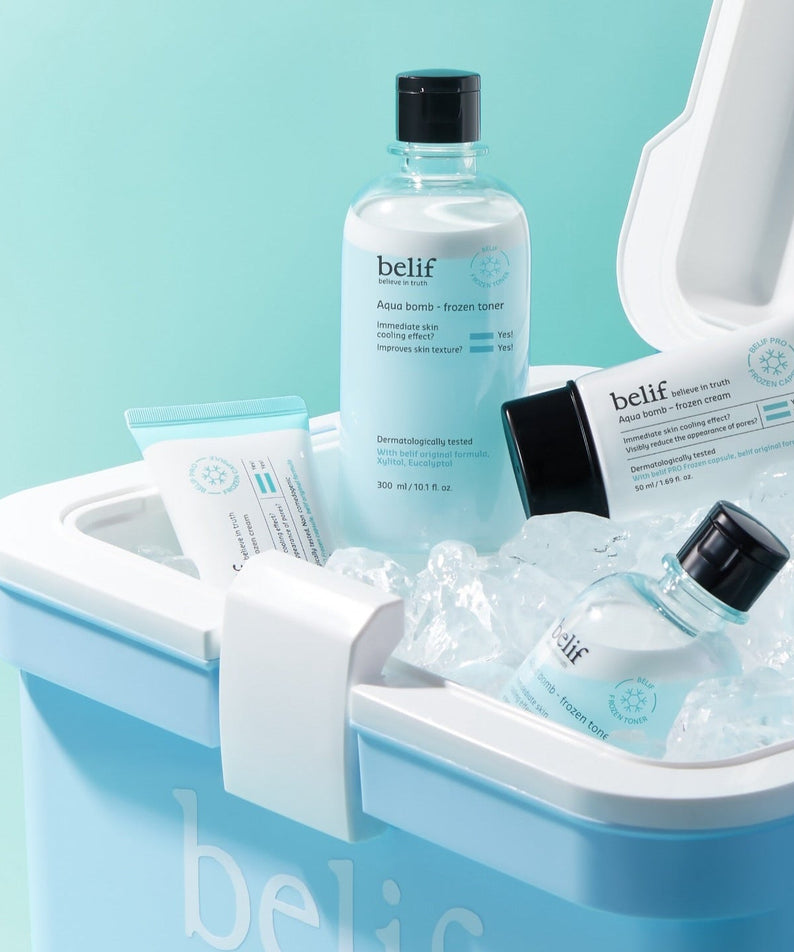 BELIF Aqua Bomb Frozen Toner 330ml displayed in ice cooler with other skincare products.