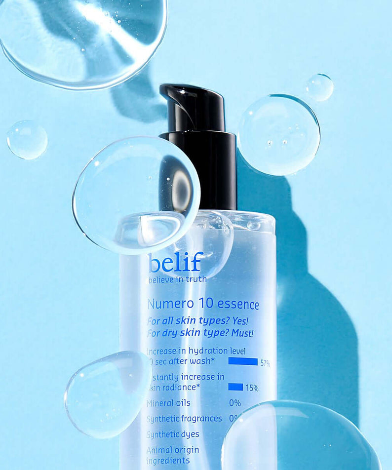 BELIF Numero 10 Essence 125ml bottle with bubbles on a blue background, skincare product for hydration and moisture.