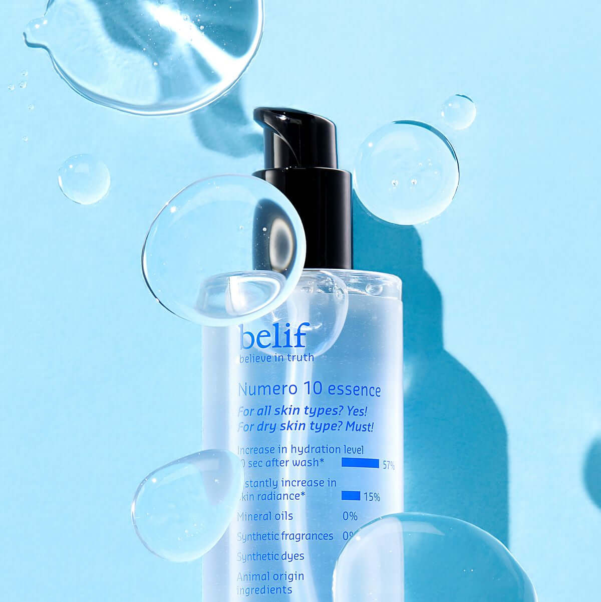 BELIF Numero 10 Essence 125ml bottle with bubbles on a blue background, skincare product for hydration and moisture.
