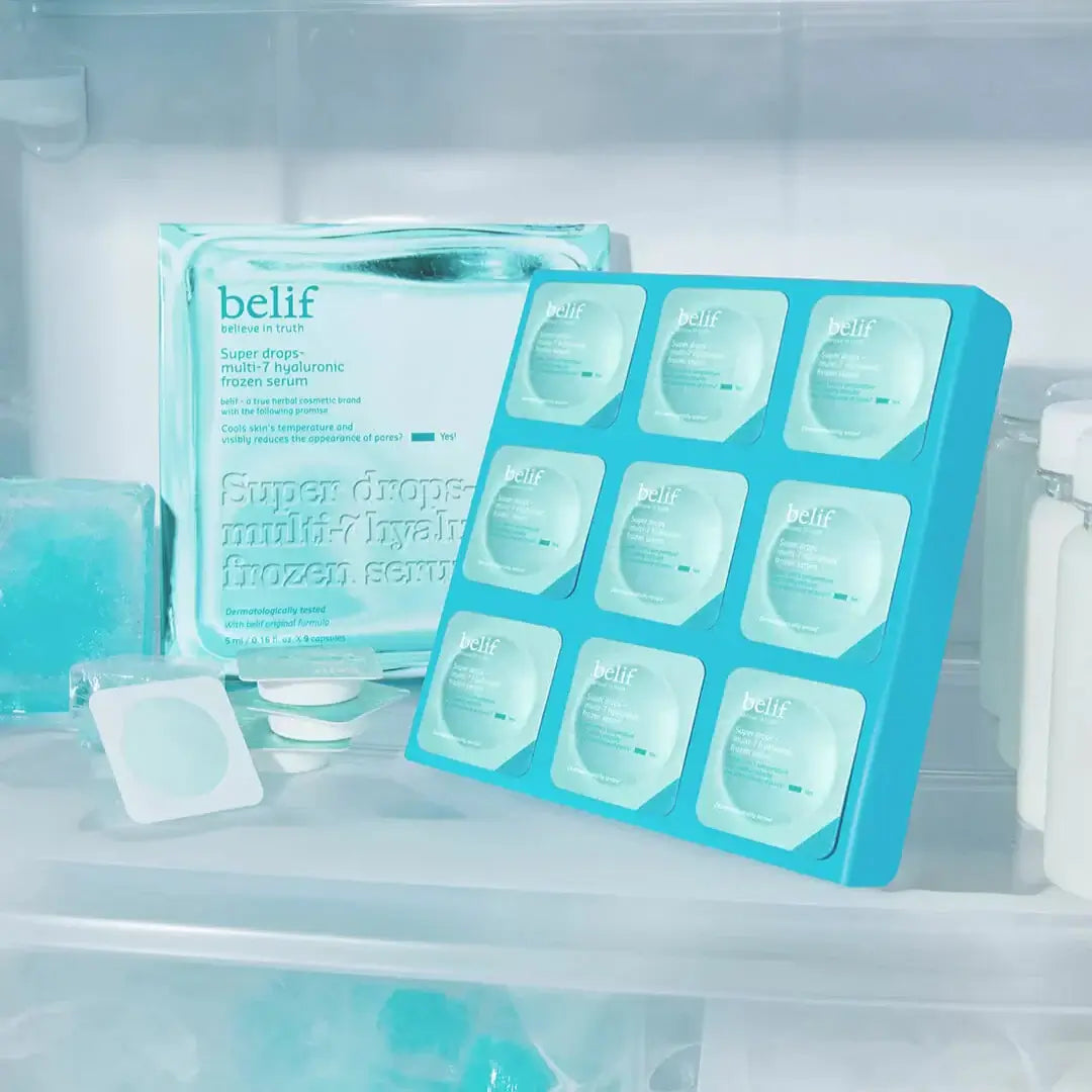BELIF Super Drop Frozen Serum 5ml displayed in a refrigerator, showcasing packaging with ice cubes and a cool blue color scheme.