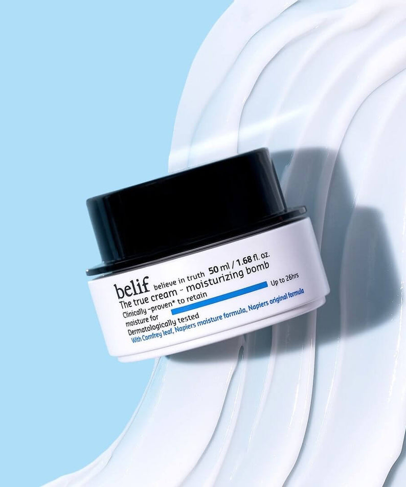 BELIF The True Cream Moisturizing Bomb 50ml on a smooth cream texture background