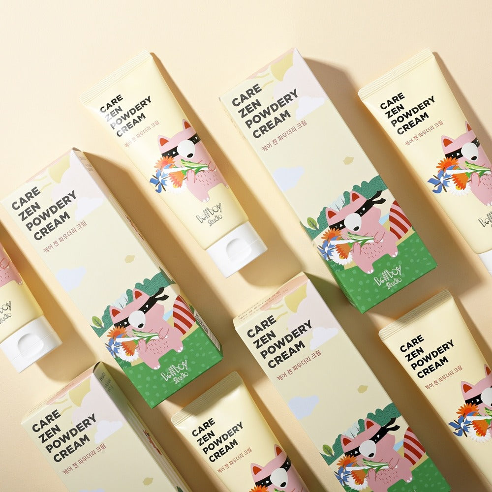 Multiple tubes and boxes of BELLBOY STUDIO Care Zen Powdery Cream 120ml displayed on a beige background.