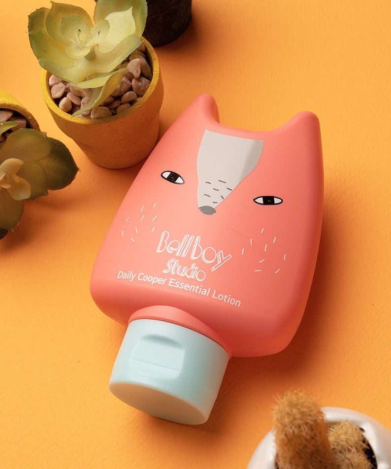 BELLBOY STUDIO Daily Cooper Moist Multi Lotion 160ml with playful packaging, displayed next to potted plants on an orange surface.