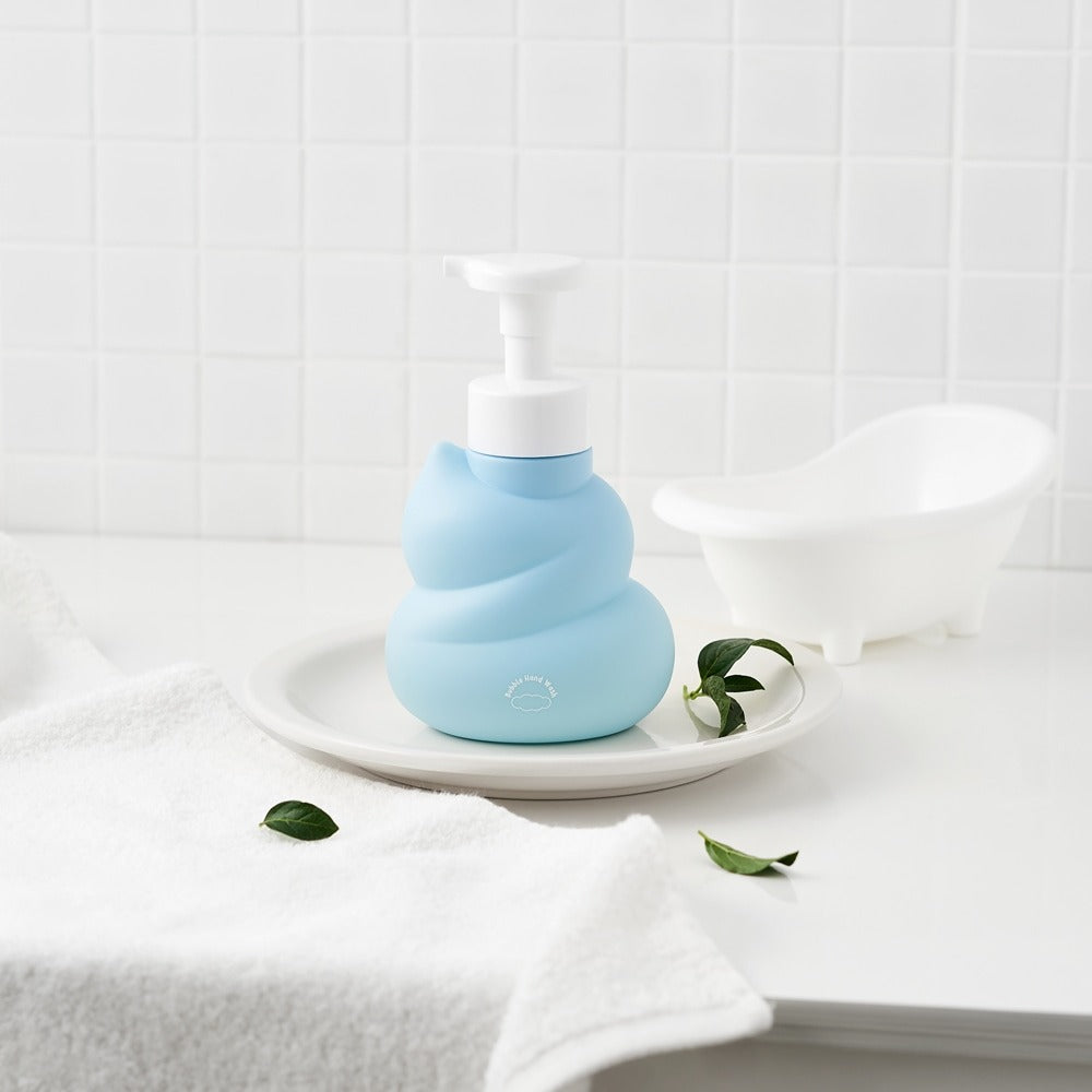 BELLBOY STUDIO Hippong Bubble Hand Wash on a bathroom countertop with towel and soap tray.