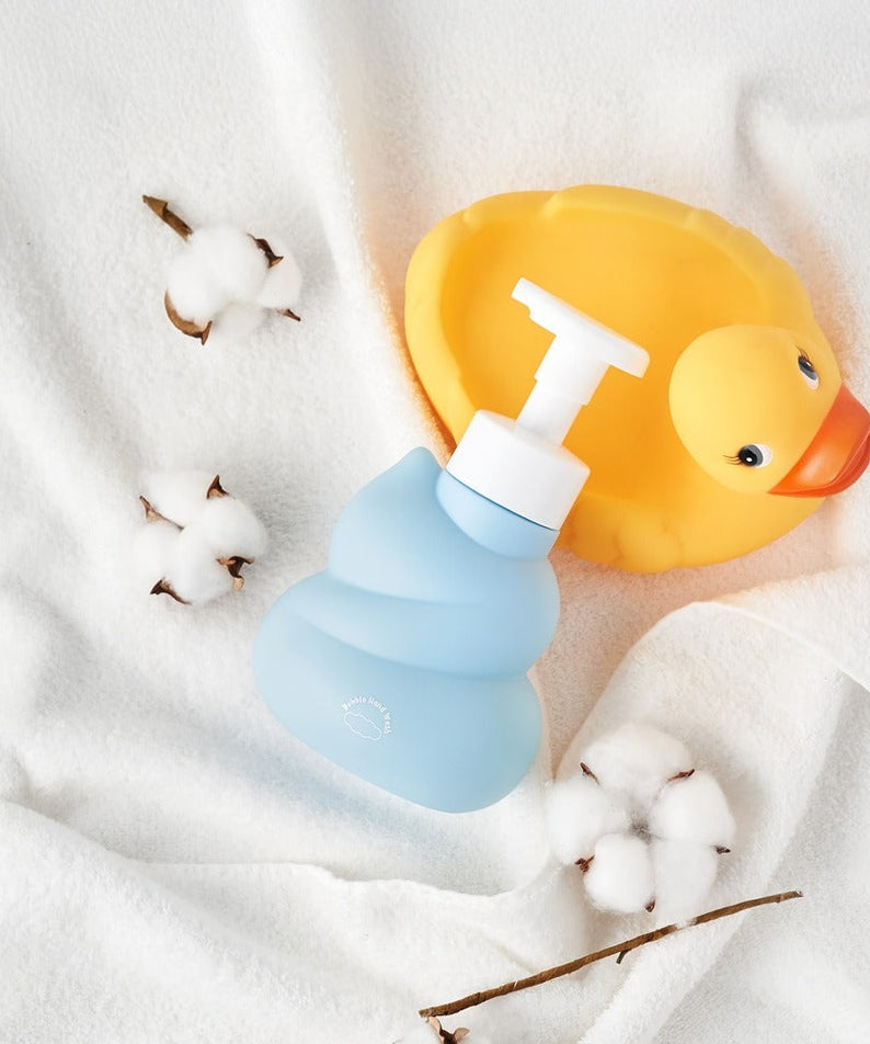 BELLBOY STUDIO Hippong Bubble Hand Wash with a rubber duck on white fabric background for baby bathing essentials.