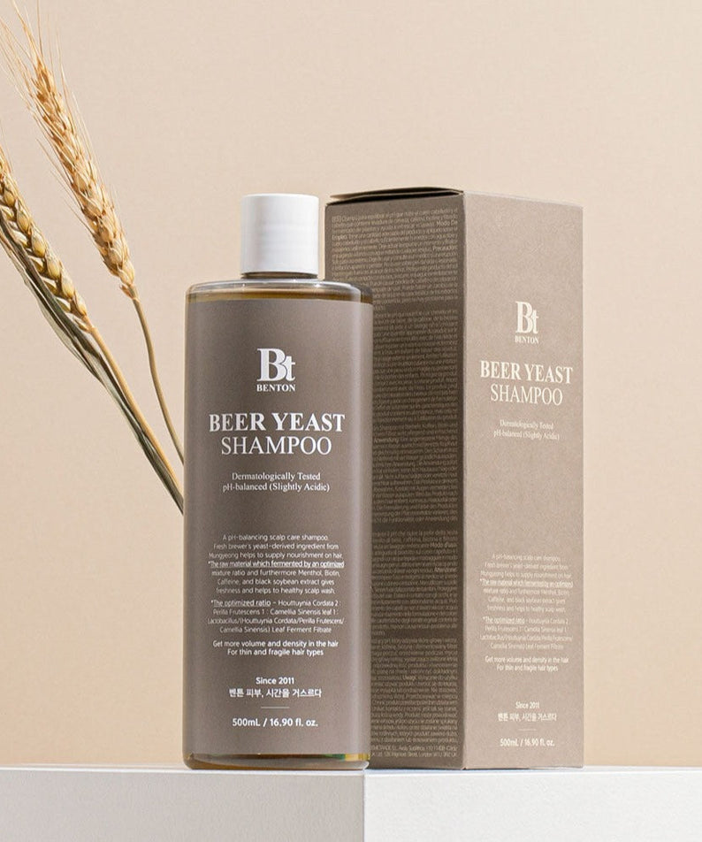 BENTON Beer Yeast Shampoo 500ml bottle and packaging with wheat stalks in the background.