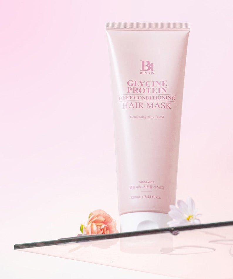 BENTON Glycine Protein Deep Conditioning Hair Mask 220ml on display with a floral background for nourishing hair care.