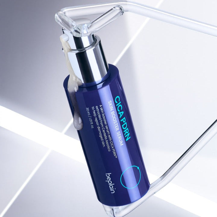 BEPLAIN Cica PDRN Skin Booster Serum 30ml bottle with sleek design on a reflective surface.